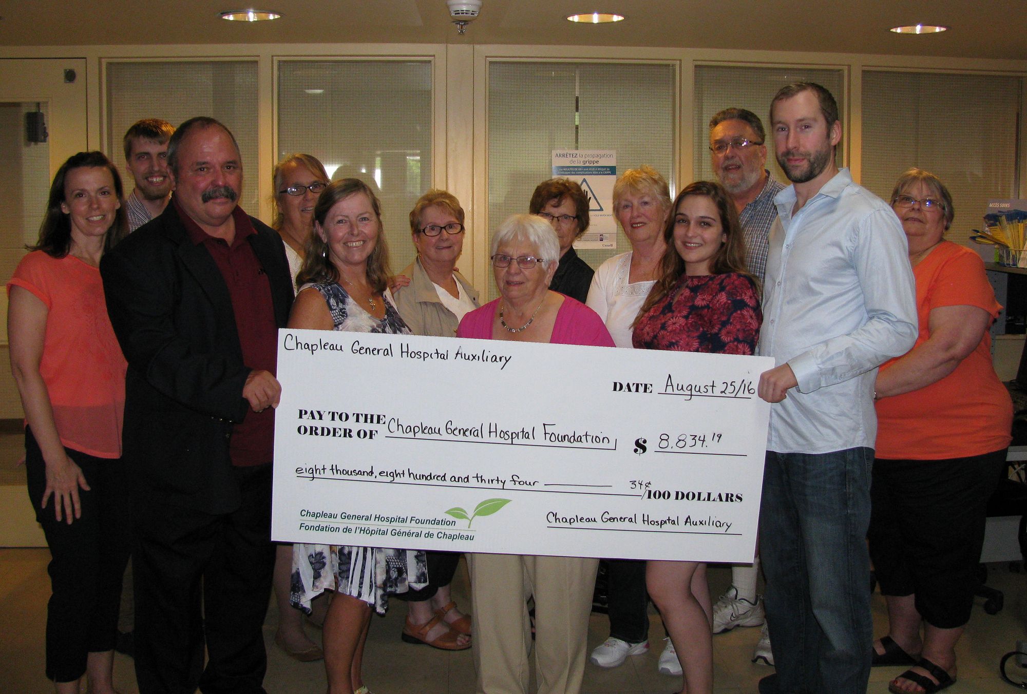 Hospital Auxiliary making donation